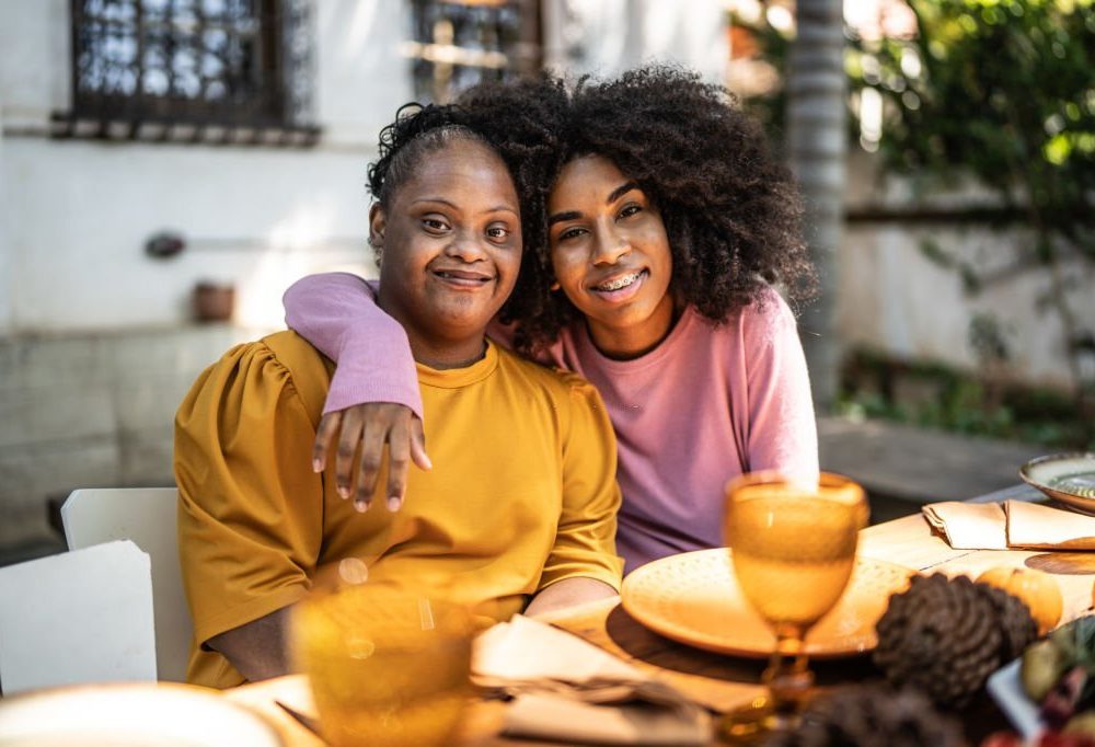 Portrait of sisters at home
