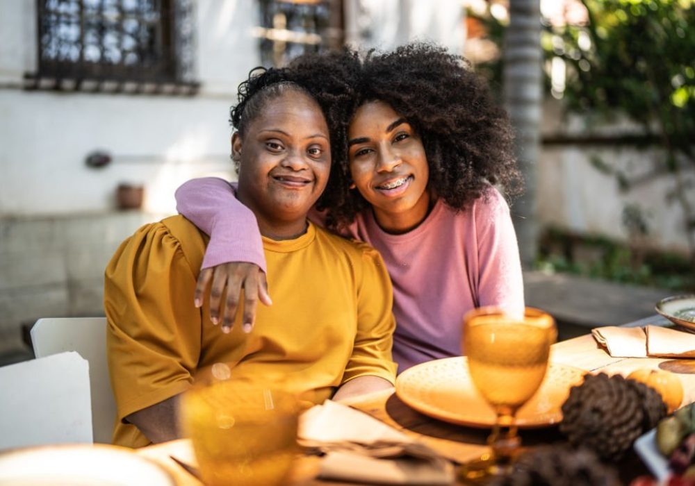 Portrait of sisters at home